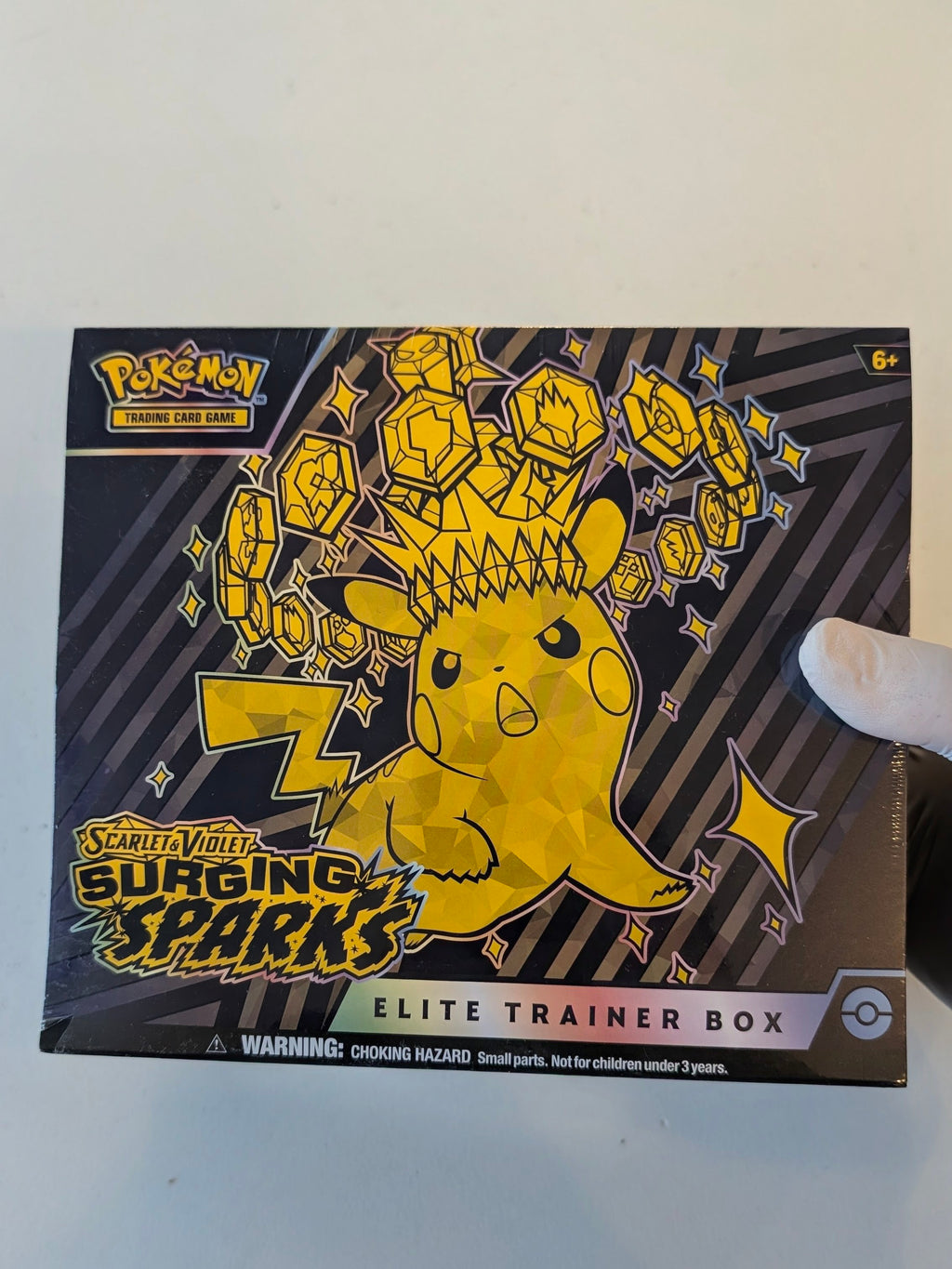 Surging Sparks Elite Trainer Box - SV08: Surging Sparks (SSP) w/ Minor Tear