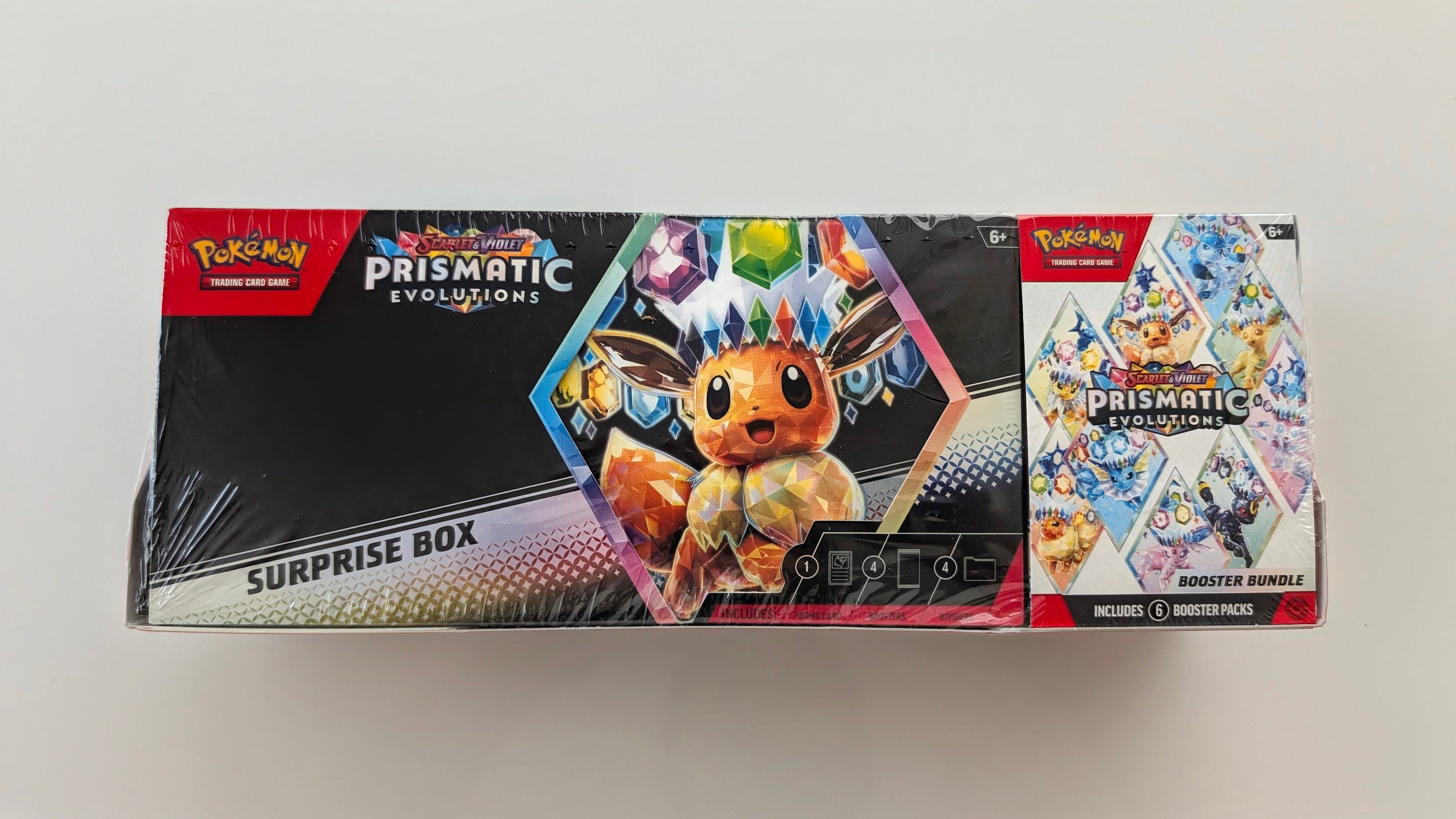 Prismatic Evolutions Booster Bundle + Surprise Box Bundle (Sam's Club) – Captain It! Finds